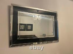 A beautiful black glass dressing table with diamond handles large wall mirror
