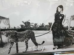 Lady in black dress walking a cheetah decor picture with crystals & mirror frame