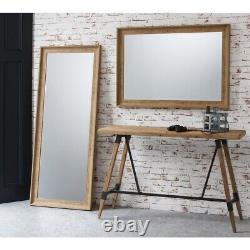 Miroir rectangulaire élégant effet chêne Fraser 104cm x 73cm suspendu au mur à manteau